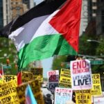العلم الفلسطيني يرفرف في احتجاجات عيد العمّال بأمريكا ضد سياسات ترامب